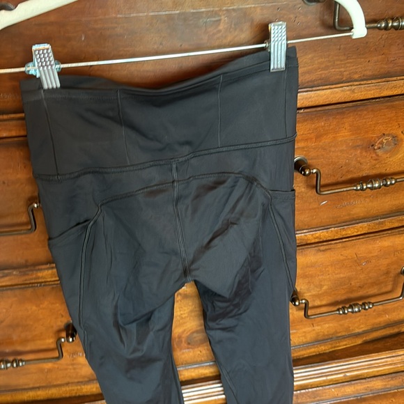 Lululemon black leggings. EUC. Size 4. Full length. Side and waist pockets. - Picture 5 of 5